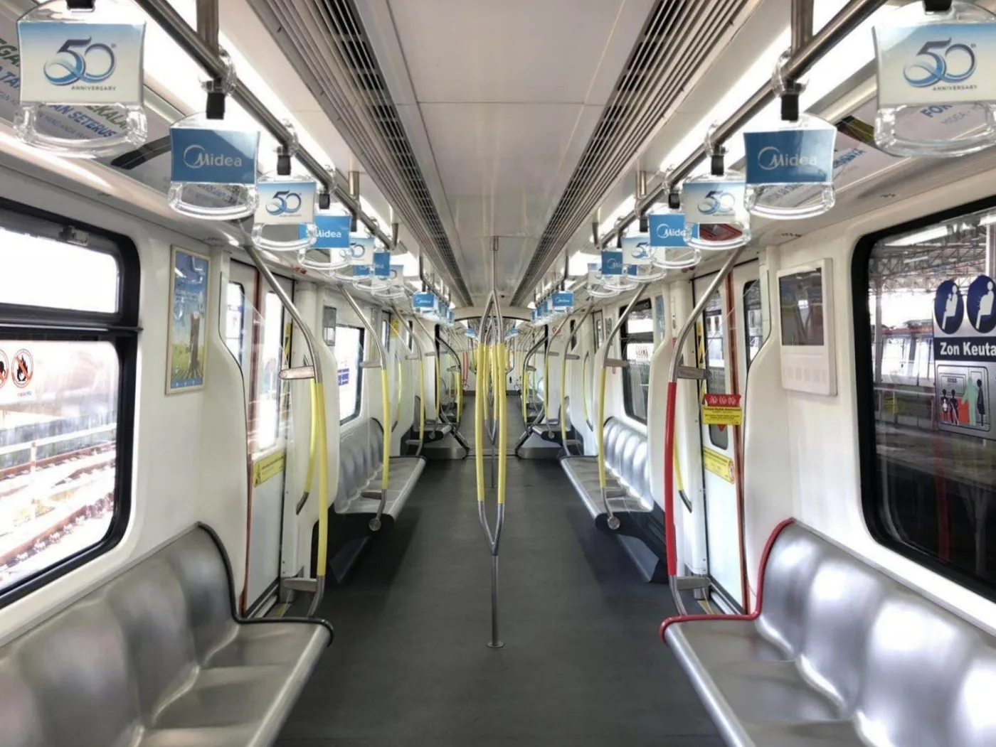 Ampang Line LRV interior — 50-year commemorative livery