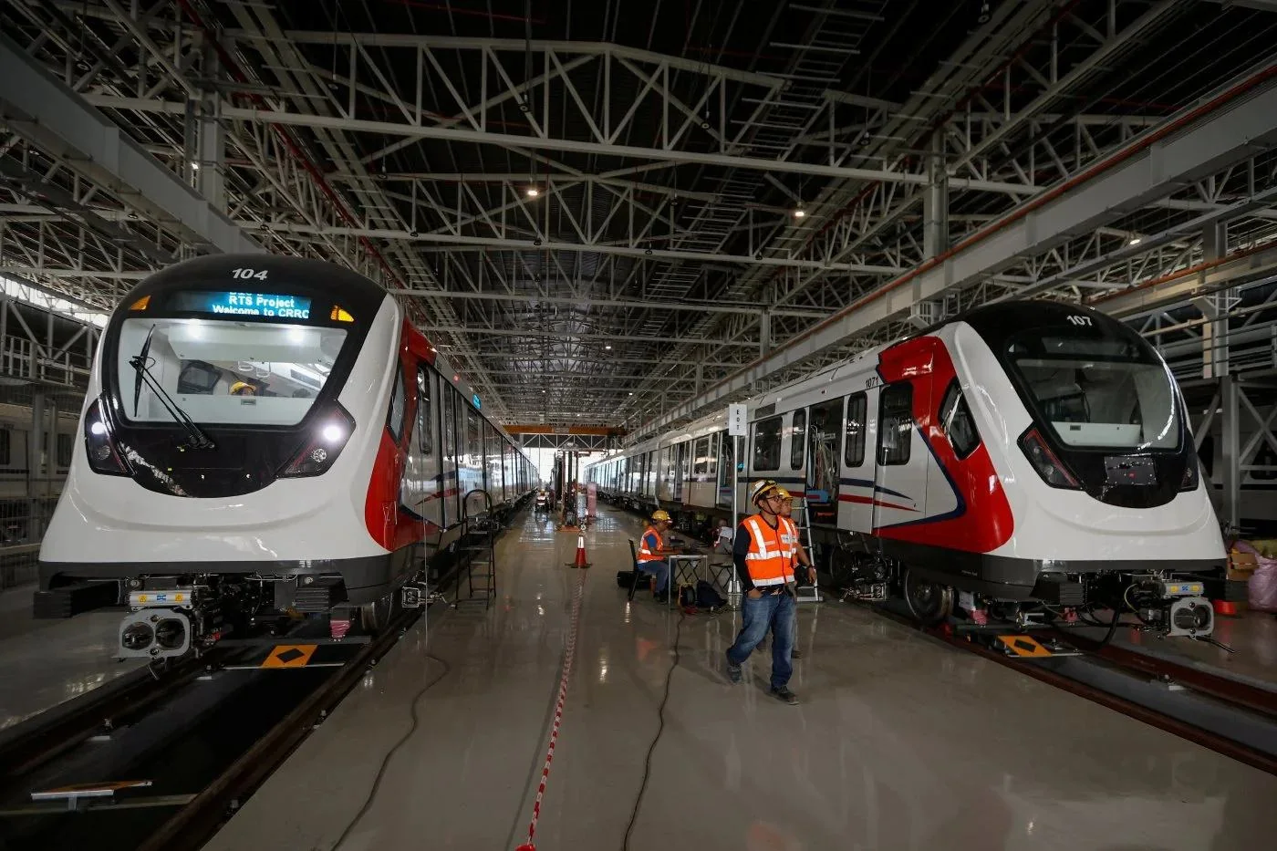 Light rail vehicles under maintenance in a CRRC depot