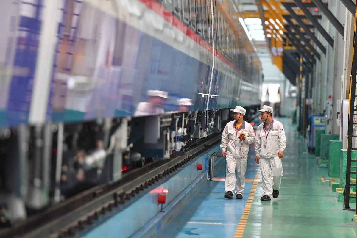 Engineers walking a maintenance depot