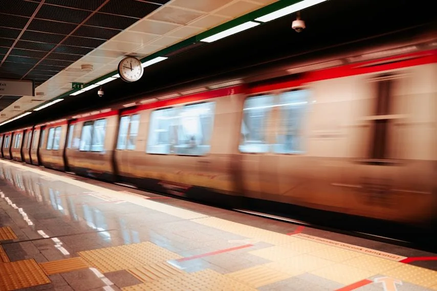 A metro train arriving at a platform