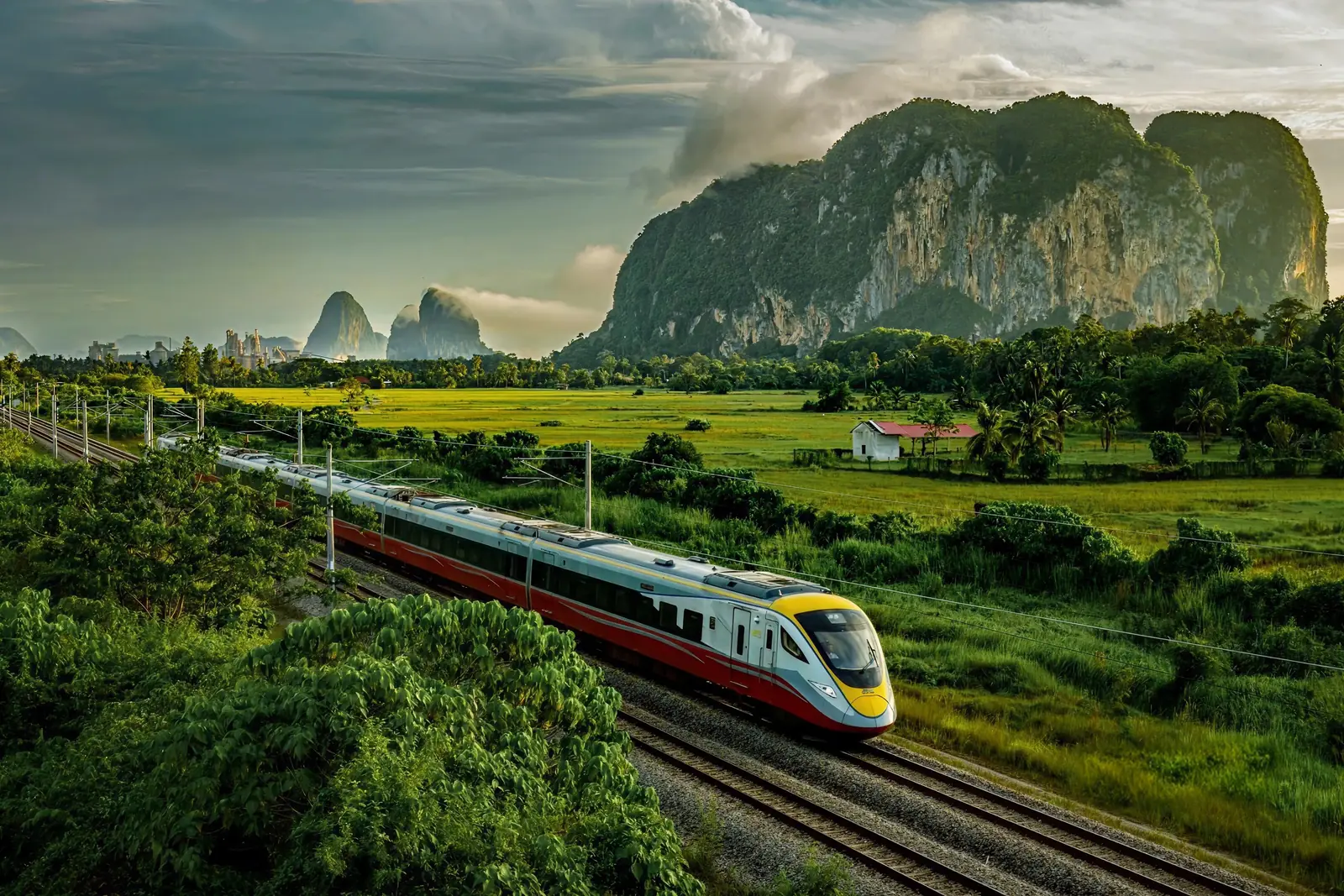 An intercity train crossing open countryside